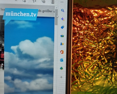 Laptopbildschirm mit geöffneter Seite von München.tv