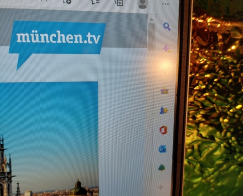 Laptop-Bildschirm mit geöffnetet München TV-Seite